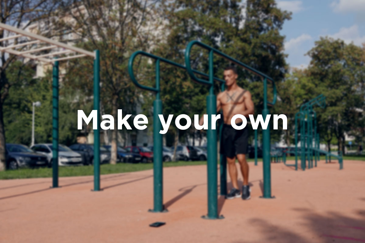 Slightly blurred picture Man standing inbetween dip bars in a workout park. ‘’Make your own’’ written over it in white letters.