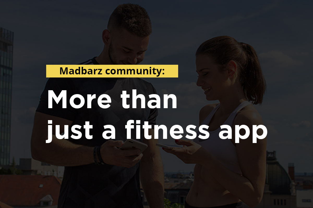 Writing: Madbarz communiti: more than just a fitness app. In the backgroung, young fit man and woman in a training equipement looking at their phones, smiling.